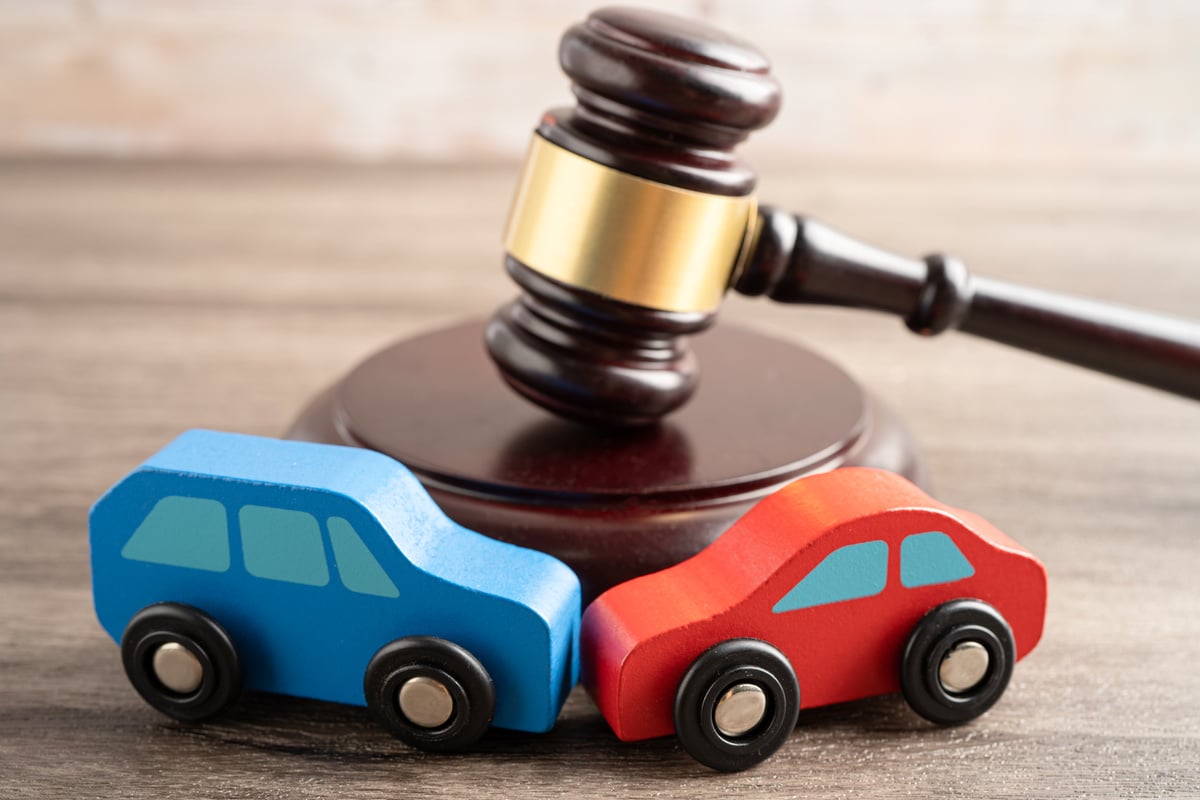 Hammer gavel judge with car vehicle accident, insurance coverage